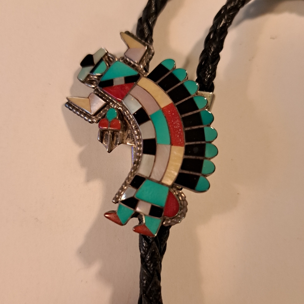 Zuni native American Rainbow Kachina Dancer Bolo Sterling silver with turquoise.